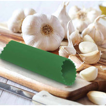 Load image into Gallery viewer, Cousin Monica&#39;s Silicone Garlic Peeler 5&quot;
