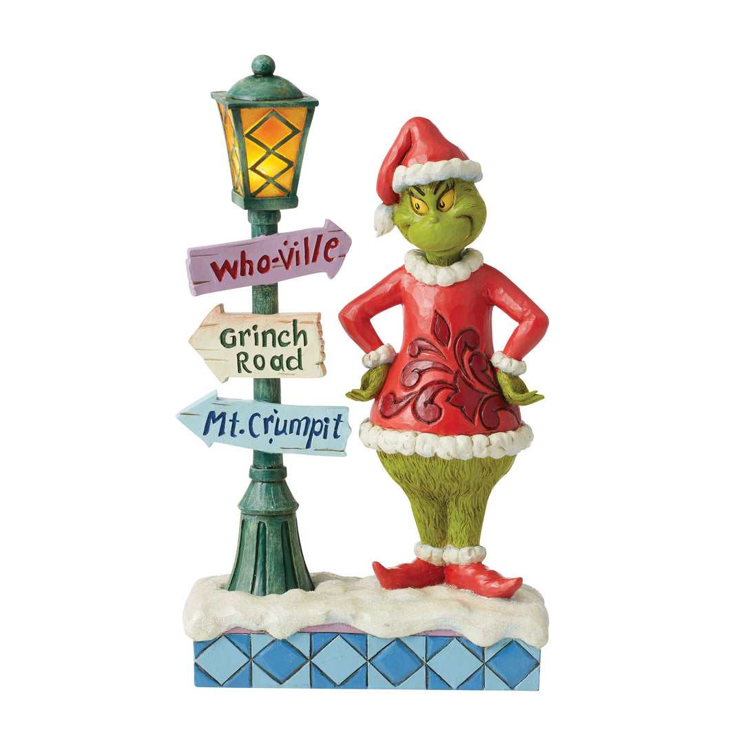 Grinch by Lit Lamppost with Street Signs